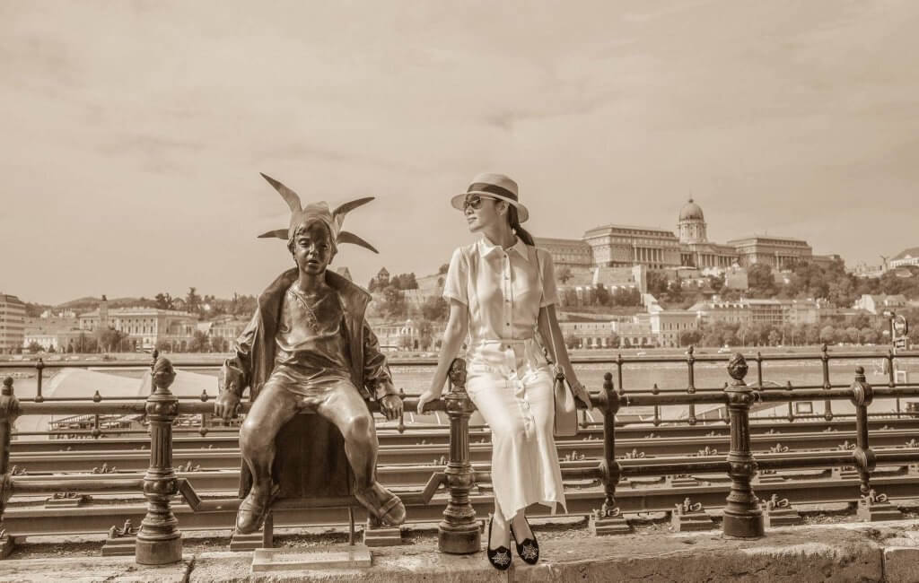 I found Little Princess statue sitting on the railings of the Danube promenade. She has been here since 1972 and has become an iconic statue. I sat next to her and she told me her story: 